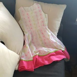 A cute Spring dress good for Easter and weddings. Many pink, green, and white.